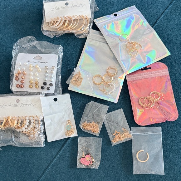 Jewelry - Over 50 pieces Assorted Gold and Silver Jewelry Set